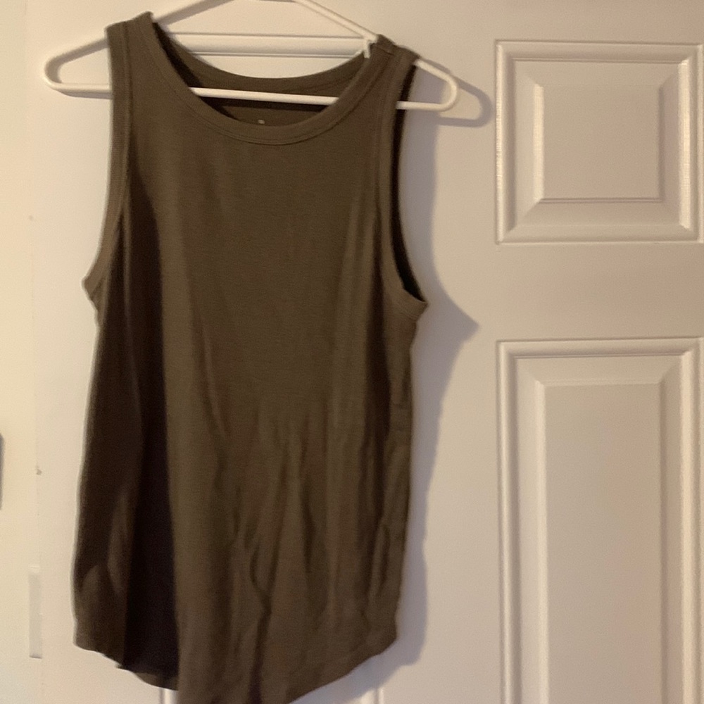 Tank Size XL fits true to size color is olive